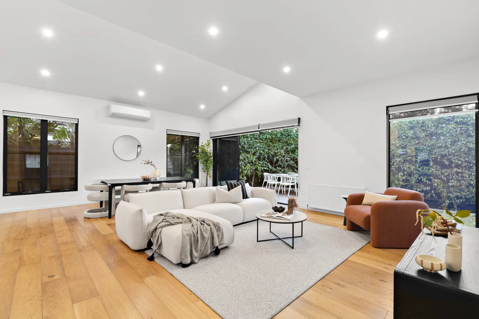 Finished living and dining under the raked ceiling